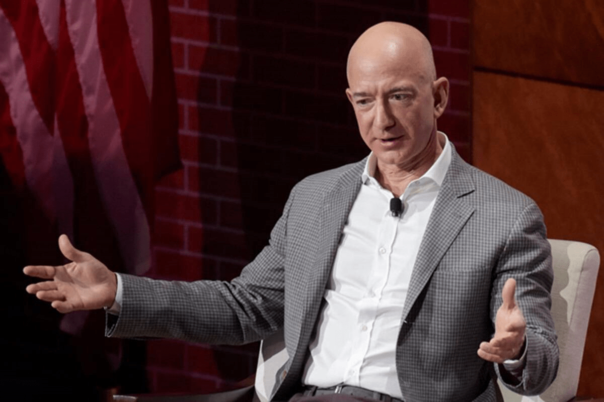 Millionaires that favor raising taxes on the rich launch protests in front of Amazon CEO Jeff Bezos